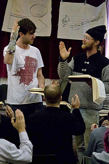 Mike Morrisoe, of Cork, Ireland, and Mike Nord, of Northampton, United States, lead at the Belfast all-day singing. Photograph by Ewan Paterson, 2011. Mike Morrisoe, of Cork, Ireland, and Mike Nord, of Northampton, United States, lead at the Belfast all-day singing. Photograph by Ewan Paterson, 2011.