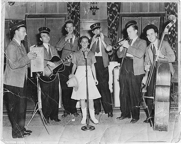 “Little Lorraine, the yodeling schoolgirl” on Fort Worth radio station WBAP with the “Washboard Swingsters” (later known as the Crazy Gang). “Little Lorraine, the yodeling schoolgirl” on Fort Worth radio station WBAP with the “Washboard Swingsters” (later known as the Crazy Gang).